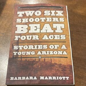 Two Six Shooters Beat Four Aces by Barbara Marriott - Rustic Brown Cover